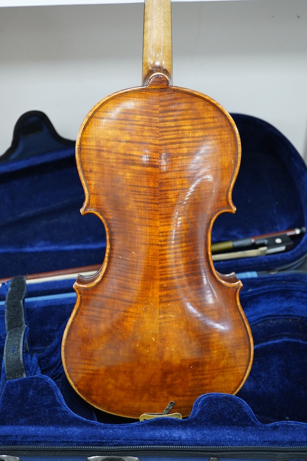 Three violins; a 3/4 Czech, a 1/2 size German and a 1/4 size Czech, all cased. Condition - fair to good